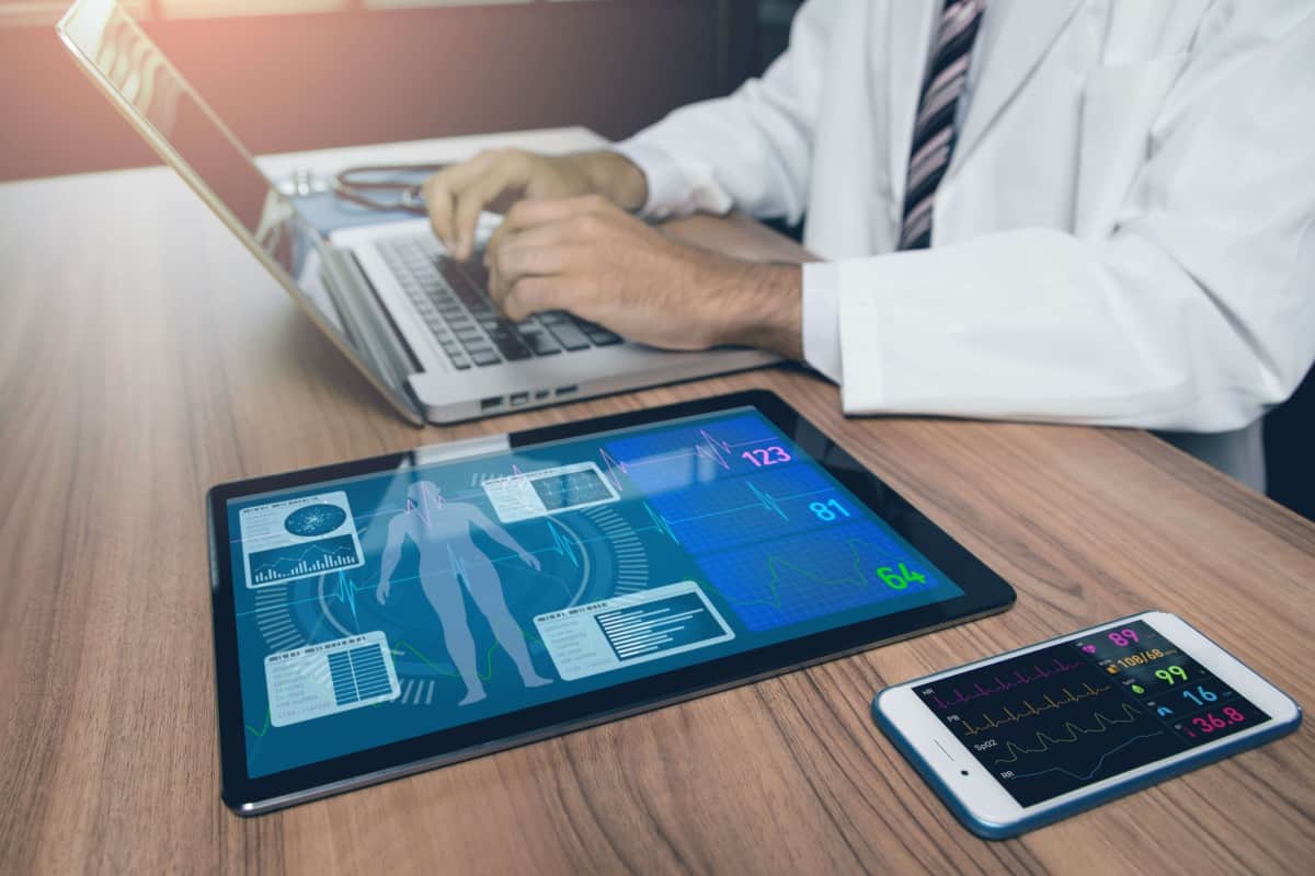 Care coordinator reviewing referral status on a referral management dashboard