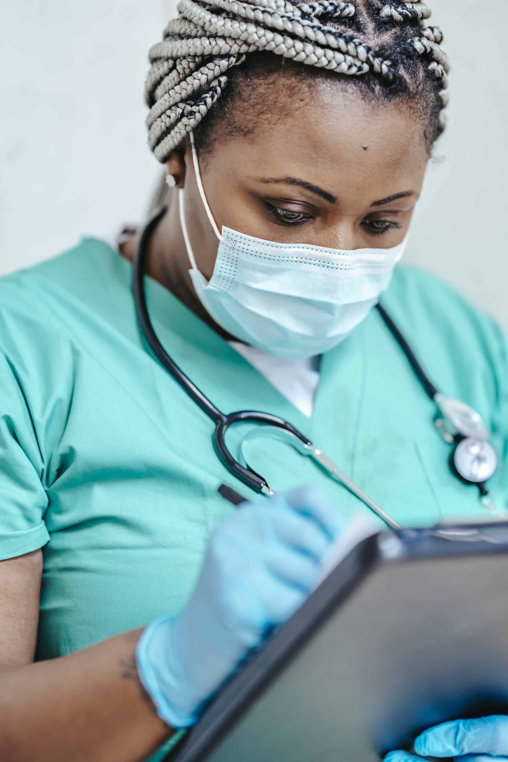 Crop doctor writing prescription on paper