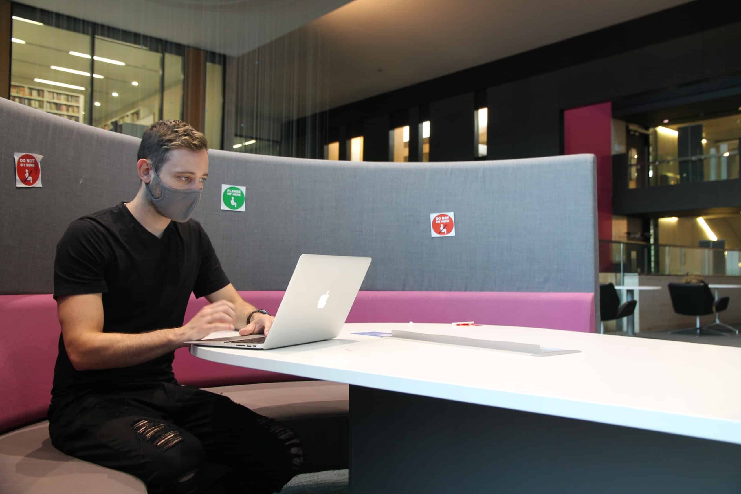 Man Working on His Laptop During COVID-19 Pandemic.