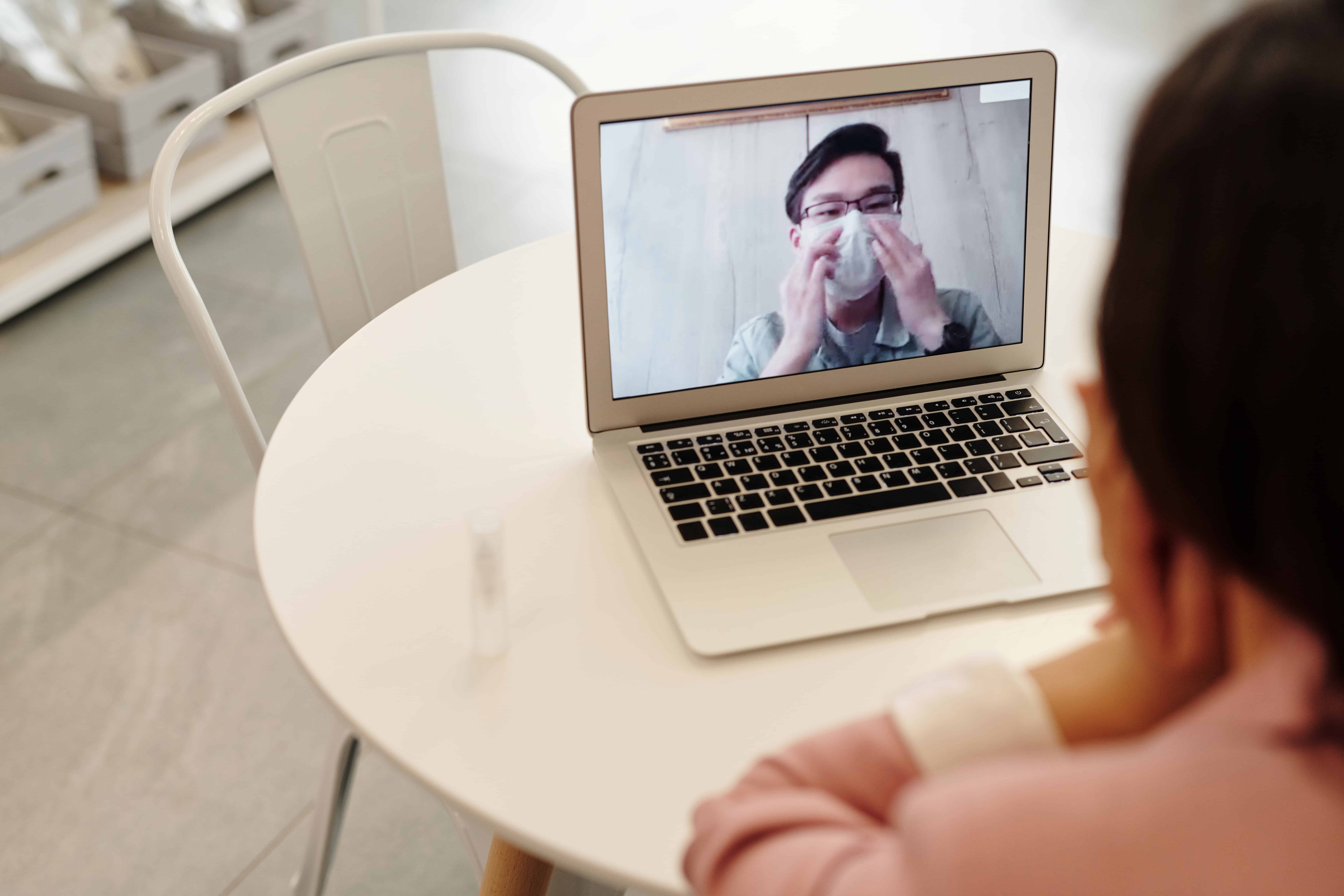 Woman in a video call with a covid 19 patient